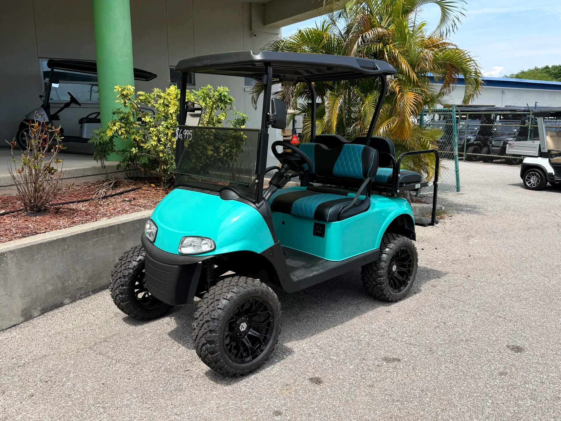 2020 E-Z-GO RXV Elite Lithium Lifted Golf Cart for Sale (Turquoise) image 0